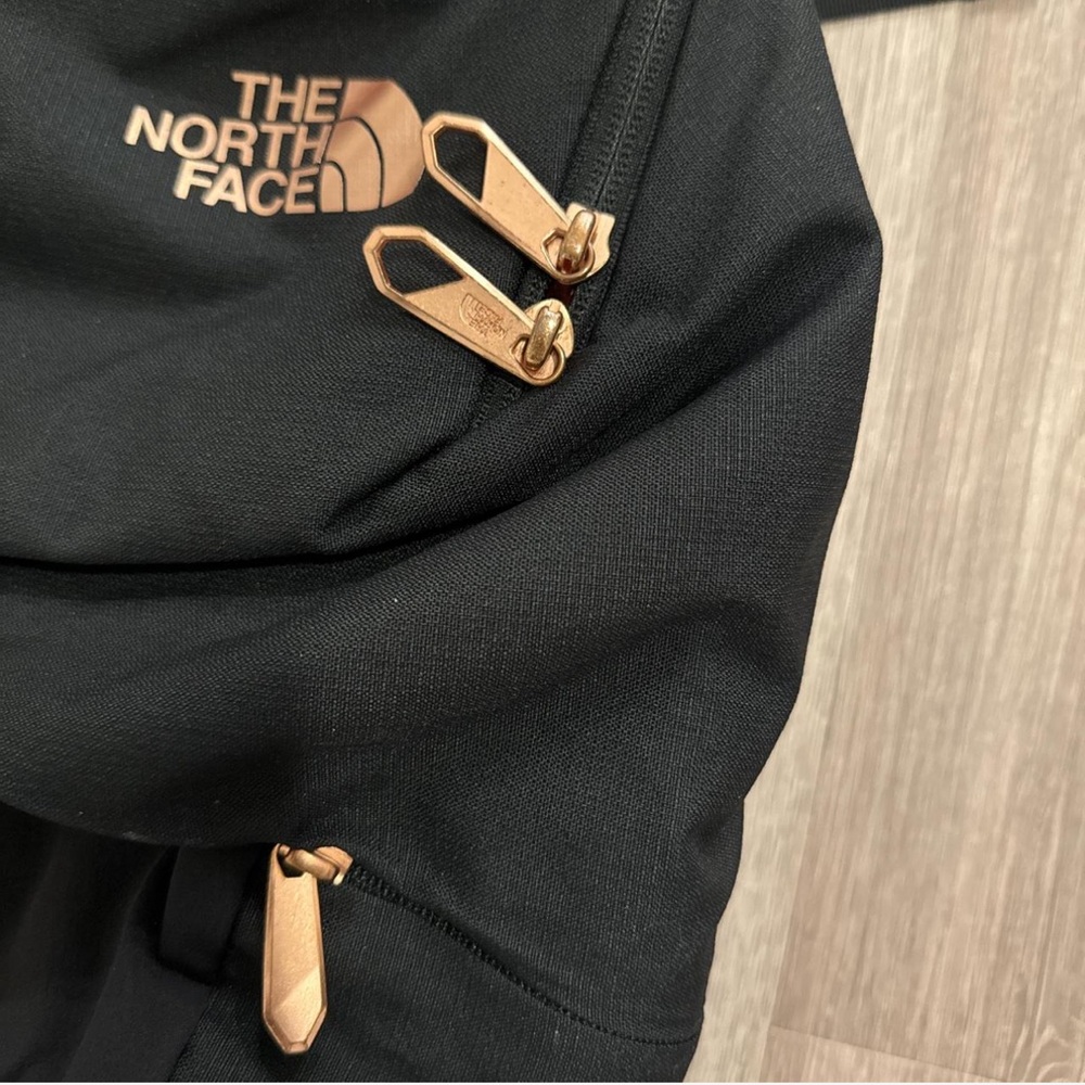 The North Face Black Backpack with Bronze Zippers